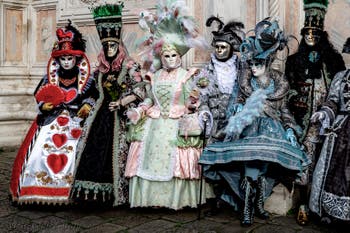 The parade of people in costume at the 2026 Venice Carnival in front of the Church of San Zaccaria.
