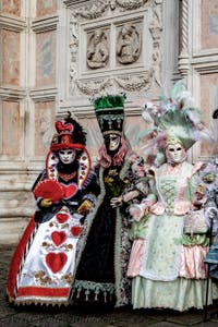 The parade of people in costume at the 2026 Venice Carnival in front of the Church of San Zaccaria.