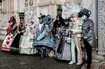 The parade of people in costume at the 2026 Venice Carnival in front of the Church of San Zaccaria.