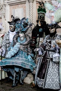 The parade of people in costume at the 2026 Venice Carnival in front of the Church of San Zaccaria.