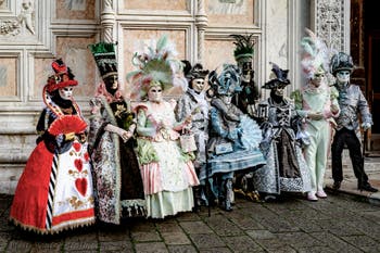 The parade of people in costume at the 2026 Venice Carnival in front of the Church of San Zaccaria.