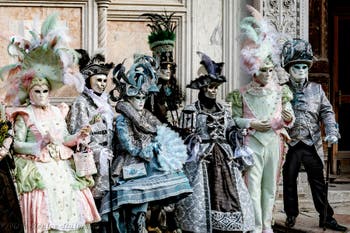The parade of people in costume at the 2026 Venice Carnival in front of the Church of San Zaccaria.