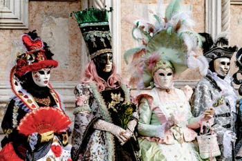 The parade of people in costume at the 2026 Venice Carnival in front of the Church of San Zaccaria.