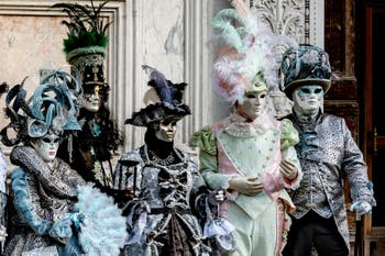 The parade of people in costume at the 2026 Venice Carnival in front of the Church of San Zaccaria.