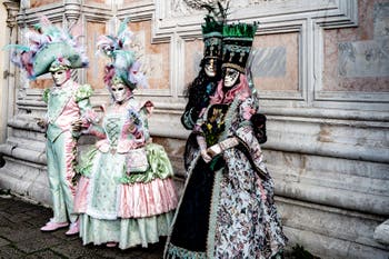 The parade of people in costume at the 2026 Venice Carnival in front of the Church of San Zaccaria.