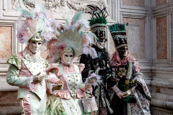 The parade of people in costume at the 2026 Venice Carnival in front of the Church of San Zaccaria.
