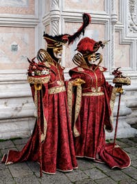 The parade of people in costume at the 2026 Venice Carnival in front of the Church of San Zaccaria.