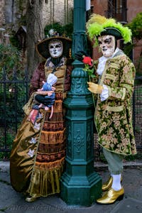 The parade of people in costume at the 2026 Venice Carnival in front of the Church of San Zaccaria.