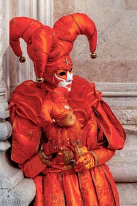 The parade of people in costume at the 2026 Venice Carnival in front of the Church of San Zaccaria.