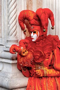 The parade of people in costume at the 2026 Venice Carnival in front of the Church of San Zaccaria.
