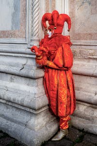 The parade of people in costume at the 2026 Venice Carnival in front of the Church of San Zaccaria.
