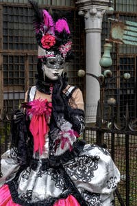 The parade of people in costume at the 2026 Venice Carnival in front of the Church of San Zaccaria.