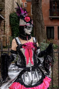 The parade of people in costume at the 2026 Venice Carnival in front of the Church of San Zaccaria.