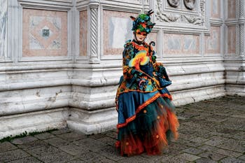 The parade of people in costume at the 2026 Venice Carnival in front of the Church of San Zaccaria.
