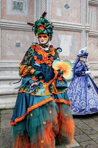 The parade of people in costume at the 2026 Venice Carnival in front of the Church of San Zaccaria.