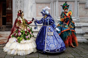 The parade of people in costume at the 2026 Venice Carnival in front of the Church of San Zaccaria.