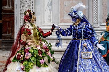 Venice carnival costumed figures