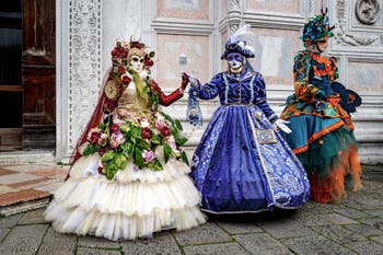 The parade of people in costume at the 2026 Venice Carnival in front of the Church of San Zaccaria.