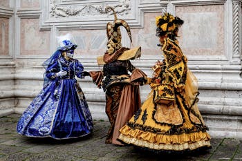 The parade of people in costume at the 2026 Venice Carnival in front of the Church of San Zaccaria.