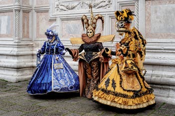 The parade of people in costume at the 2026 Venice Carnival in front of the Church of San Zaccaria.