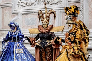The parade of people in costume at the 2026 Venice Carnival in front of the Church of San Zaccaria.