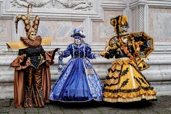 The parade of people in costume at the 2026 Venice Carnival in front of the Church of San Zaccaria.