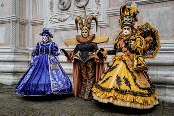 The parade of people in costume at the 2026 Venice Carnival in front of the Church of San Zaccaria.