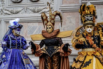 The parade of people in costume at the 2026 Venice Carnival in front of the Church of San Zaccaria.
