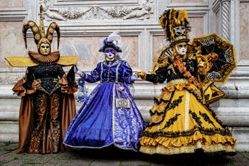The parade of people in costume at the 2026 Venice Carnival in front of the Church of San Zaccaria.