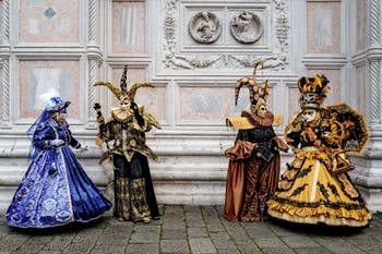 The parade of people in costume at the 2026 Venice Carnival in front of the Church of San Zaccaria.