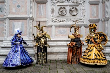 The parade of people in costume at the 2026 Venice Carnival in front of the Church of San Zaccaria.