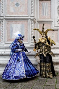 The parade of people in costume at the 2026 Venice Carnival in front of the Church of San Zaccaria.