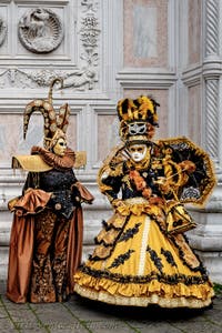 The parade of people in costume at the 2026 Venice Carnival in front of the Church of San Zaccaria.