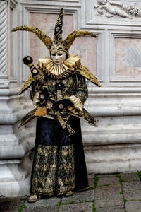 The parade of people in costume at the 2026 Venice Carnival in front of the Church of San Zaccaria.