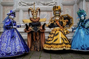The parade of people in costume at the 2026 Venice Carnival in front of the Church of San Zaccaria.