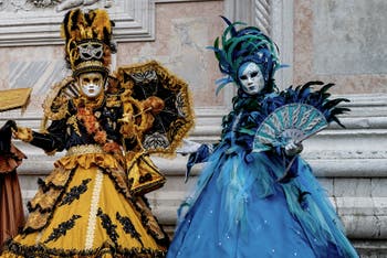 The parade of people in costume at the 2026 Venice Carnival in front of the Church of San Zaccaria.
