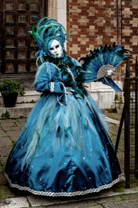 The parade of people in costume at the 2026 Venice Carnival in front of the Church of San Zaccaria.