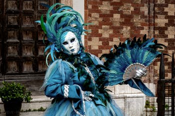 Venice carnival costumed figures