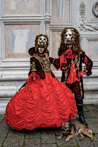 The parade of people in costume at the 2026 Venice Carnival in front of the Church of San Zaccaria.