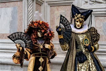 The parade of people in costume at the 2026 Venice Carnival in front of the Church of San Zaccaria.