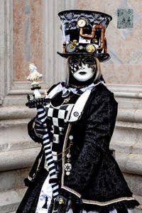 The parade of people in costume at the 2026 Venice Carnival in front of the Church of San Zaccaria.