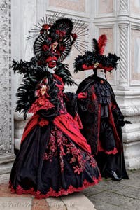 The parade of people in costume at the 2026 Venice Carnival in front of the Church of San Zaccaria.