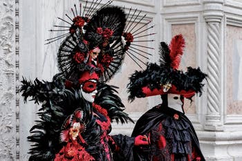 The parade of people in costume at the 2026 Venice Carnival in front of the Church of San Zaccaria.