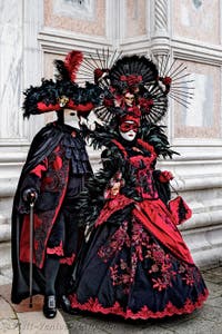 The parade of people in costume at the 2026 Venice Carnival in front of the Church of San Zaccaria.