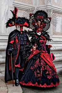 The parade of people in costume at the 2026 Venice Carnival in front of the Church of San Zaccaria.