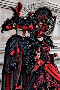 The parade of people in costume at the 2026 Venice Carnival in front of the Church of San Zaccaria.