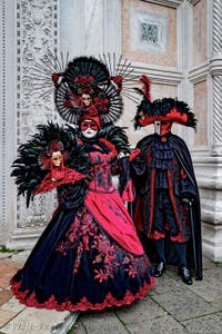 The parade of people in costume at the 2026 Venice Carnival in front of the Church of San Zaccaria.