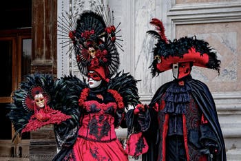 The parade of people in costume at the 2026 Venice Carnival in front of the Church of San Zaccaria.