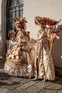 The parade of people in costume at the 2026 Venice Carnival in Campo San Lorenzo.