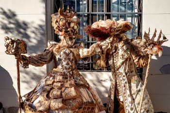 Venice carnival costumed figures